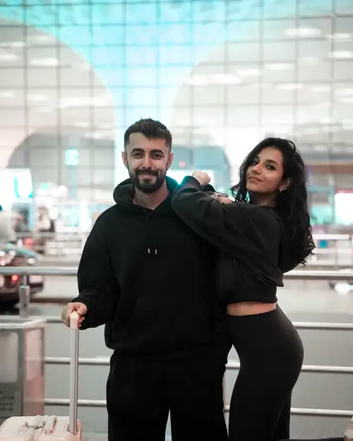 Mohnish and Akshitha at the airport